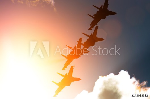 Picture of Aircraft fighter jets against the background of sky and sun
